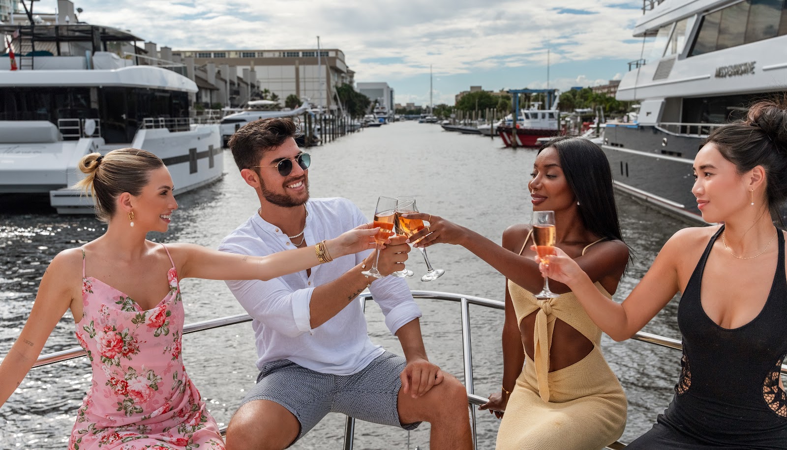 Group of friends enjoying dock and dine at Boatyard